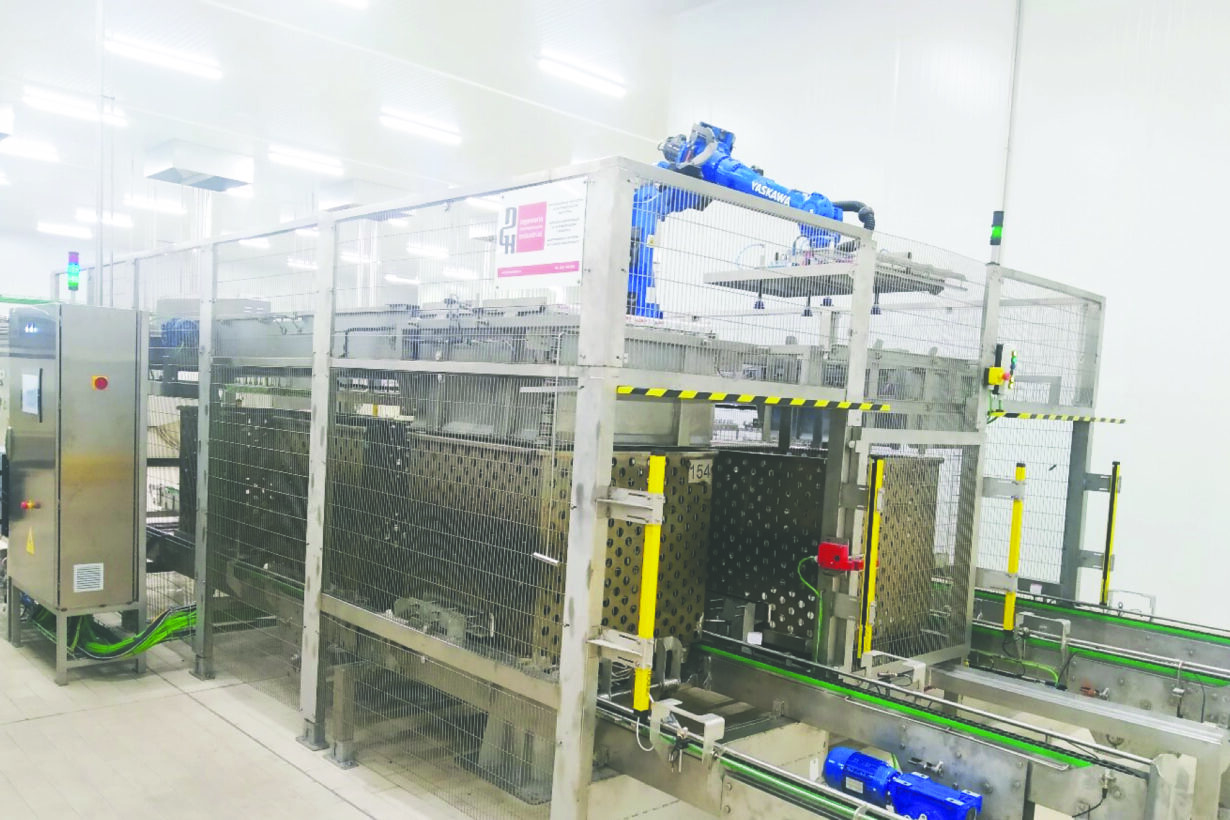 Solución de encestonado y desencestonado de latas en carros para autoclave con robots Yaskawa realizada por DGH Robótica para la empresa de conservas Hijos de Carlos Albo